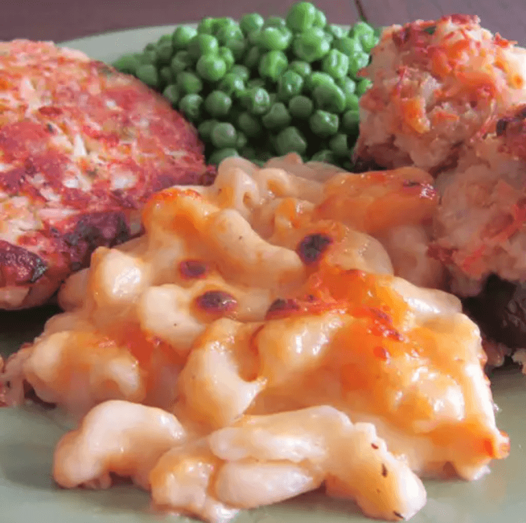 Homemade mac and cheese with Velveeta paired with salad and roasted vegetables