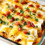 Cheesy breakfast enchiladas in baking dish for brunch