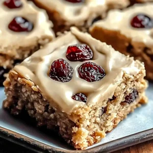 Oatmeal Raisin Cookie Bars: A Chewy, Comforting Summer Treat 3 Chewy Oatmeal Raisin Cookie Bars on a plate