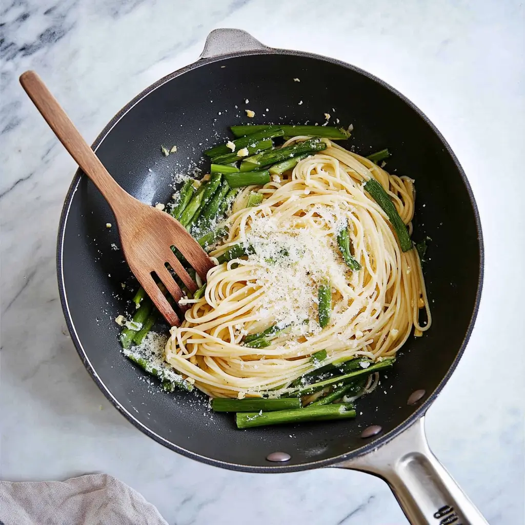 Lemon Garlic Scape Pasta – A Summer Pasta Masterpiece 2 Chef preparing Lemon Garlic Scape Pasta