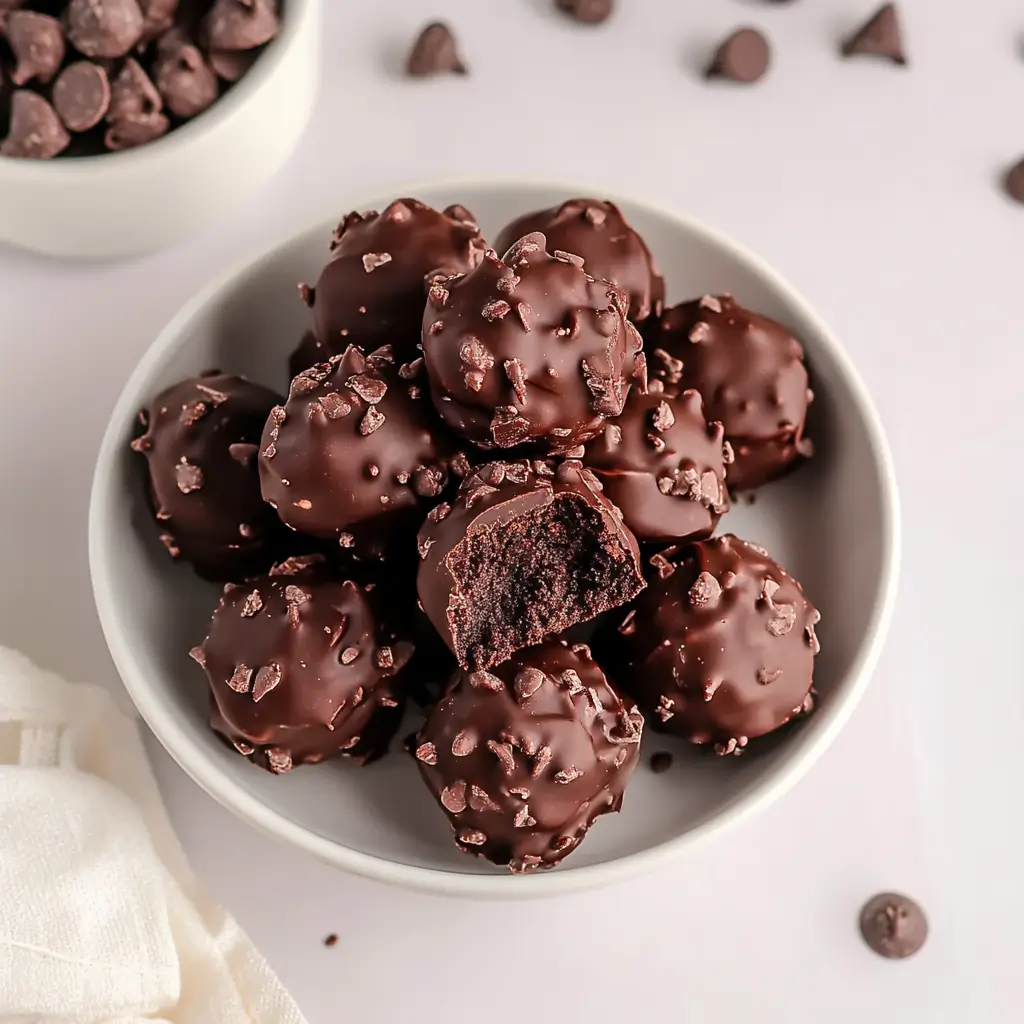 No-Bake Brownie Bites on rustic plate
