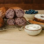 Blueberry Sourdough Bagels: A Healthier, Flavorful Twist to Classic Comfort 7 Blueberry Sourdough Bagels on a Rustic Table