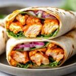 Buffalo Chicken Wraps That Hit Every Craving Just Right 5 Buffalo Chicken Wraps sliced with ranch sauce