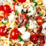 Caprese Pasta Salad: A Fresh Twist on an Italian Classic 5 Caprese Pasta Salad served outdoors on a summer table