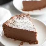 Chocolate Cottage Cheese Cake: A Delicious, Protein-Packed Treat 5 Chocolate Cottage Cheese Cake served with whipped cream and berries