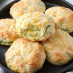 Zucchini Cheddar Biscuits: Comfort Food with a Fresh Twist 9 Zucchini cheddar biscuits in a cast iron skillet