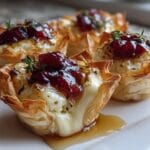 20-Minute Cranberry Brie Bites: Irresistible Holiday Magic 9 Cranberry Brie Bites in Phyllo Cups