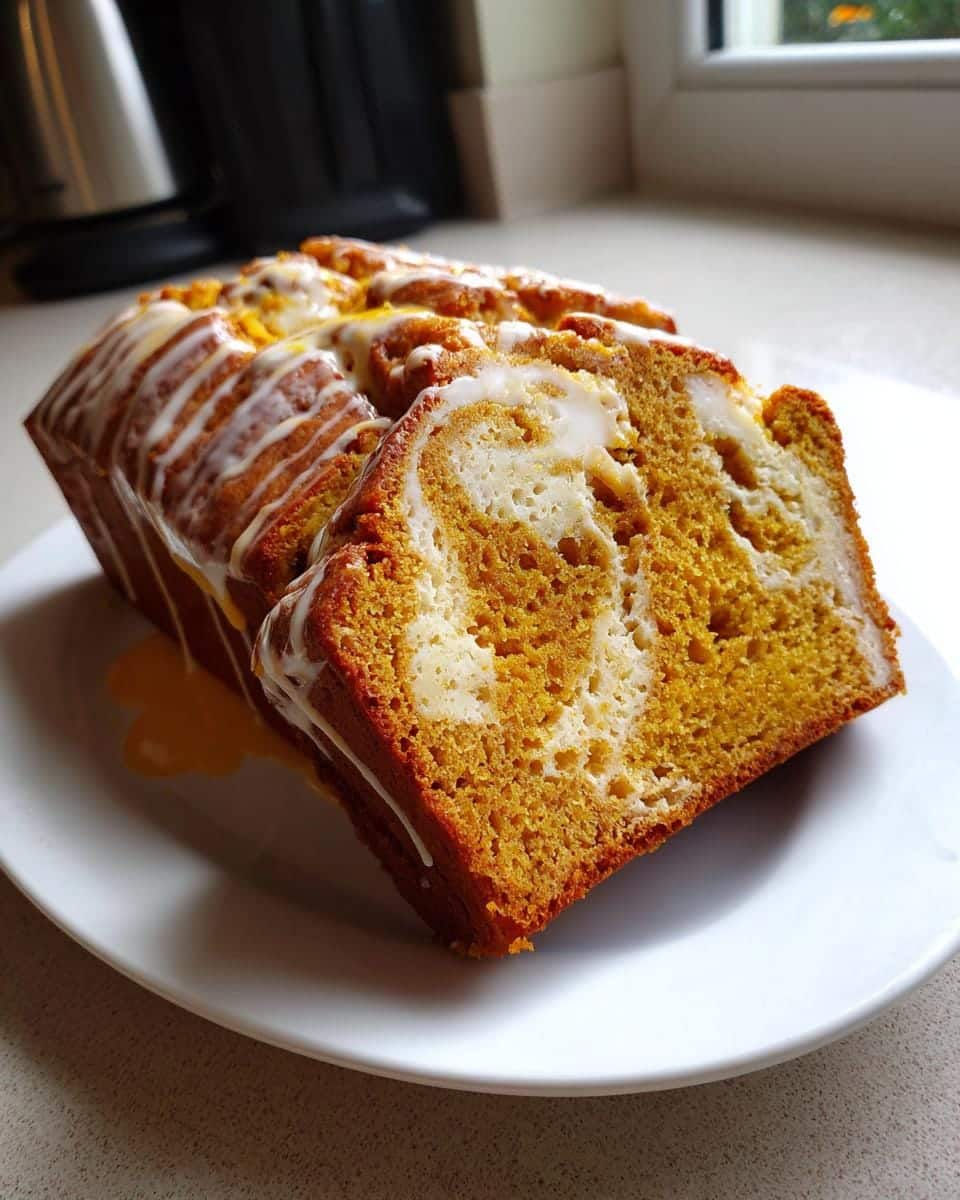 Cream Cheese Swirled Pumpkin Bread: 5-Star Fall Magic in Every Bite 5 Cream Cheese Swirled Pumpkin Butter Bread with Maple Glaze - detail 1