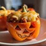 Irresistible Jack-o'-Lantern Stuffed Bell Peppers: 4 Spooky Secrets 11 Jack-o'-Lantern Stuffed Bell Peppers