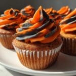 Spooky 18-Minute Orange and Black Halloween Cupcakes with Buttercream 11 Orange and Black Halloween Cupcakes with Buttercream