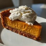 Silky Pumpkin Pie with Gingersnap Crust Recipe - 5 Secrets for Perfection 5 Silky Pumpkin Pie with Gingersnap Crust and Whipped Cream